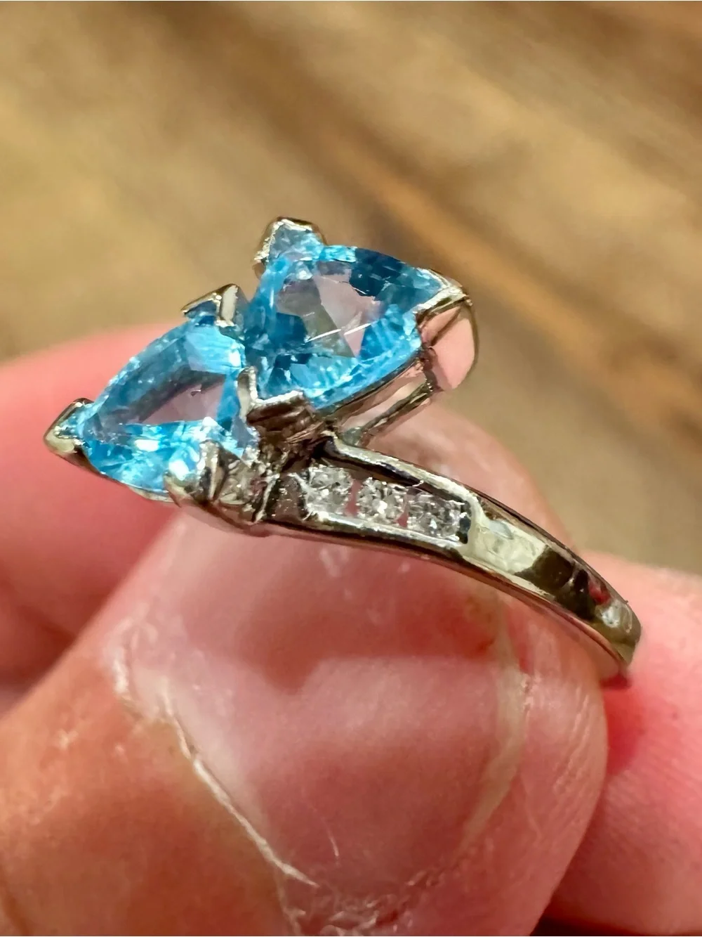 10K White Gold Blue Topaz and Diamond Bypass Ring
